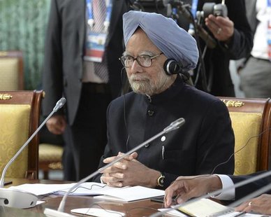India's Prime Minister Manmohan Singh attends a BRICS leaders' meeting at the G20 Summit in Strelna near St. Petersburg, September 5, 2013. India's Prime Minister Manmohan Singh attends a BRICS leaders' meeting at the G20 Summit in Strelna near St. Petersburg, September 5, 2013.
