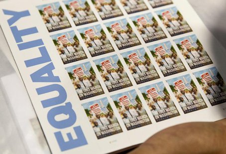 A page of U.S. Postal Service limited-edition stamps commemorating the 1963 'March on Washington for Jobs and Freedom" is displayed in Washi A page of U.S. Postal Service limited-edition stamps commemorating the 1963 'March on Washington for Jobs and Freedom" is displayed in Washi