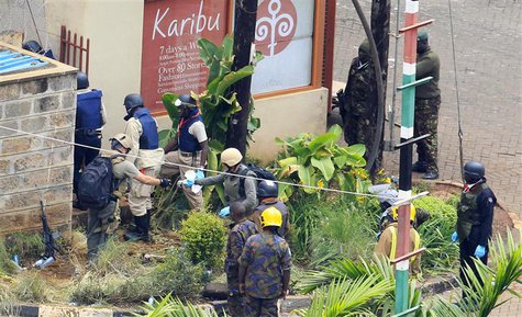 Foreign forensic experts, flanked by Kenyan military personnel, check the perimeter walls around Westgate shopping mall in Nairobi September Foreign forensic experts, flanked by Kenyan military personnel, check the perimeter walls around Westgate shopping mall in Nairobi September