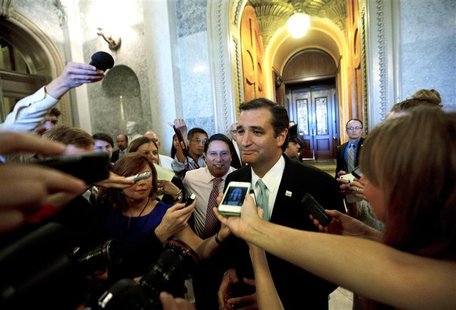 U.S. Senator Ted Cruz (R-TX) speaks to the press after leaving the Senate Chamber after a marathon attack on "Obamacare," at the U.S. Capito U.S. Senator Ted Cruz (R-TX) speaks to the press after leaving the Senate Chamber after a marathon attack on "Obamacare," at the U.S. Capito