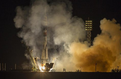 Soyuz TMA-10M spacecraft carrying the International Space Station (ISS) crew of U.S. astronaut U.S. astronaut Michael Hopkins, Russian cosmo Soyuz TMA-10M spacecraft carrying the International Space Station (ISS) crew of U.S. astronaut U.S. astronaut Michael Hopkins, Russian cosmo
