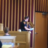Officer Robert Erickson shows jury the knife used in the stabbing Officer Robert Erickson shows jury the knife used in the stabbing