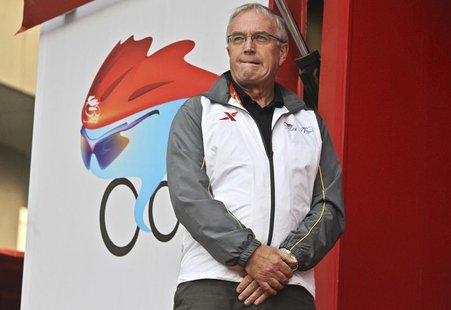 Pat Mcquaid, president of the Union Cycliste Internationale (UCI), waits for the award ceremony for stage four of the Tour of Beijing race, Pat Mcquaid, president of the Union Cycliste Internationale (UCI), waits for the award ceremony for stage four of the Tour of Beijing race,