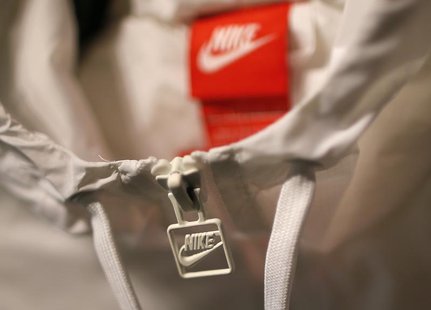 A Nike logo is seen on a jacket in the Nike store in Santa Monica, California, September 25, 2013. REUTERS/Lucy Nicholson A Nike logo is seen on a jacket in the Nike store in Santa Monica, California, September 25, 2013. REUTERS/Lucy Nicholson