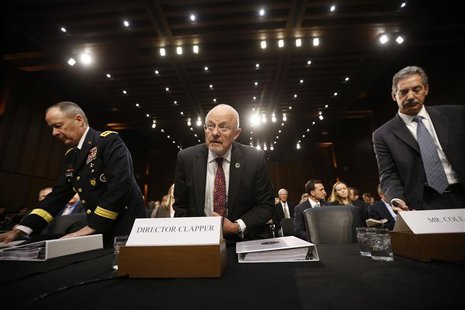 Director of National Intelligence James Clapper (C), National Security Agency Director General Keith Alexander (L) and Deputy Attorney Gener Director of National Intelligence James Clapper (C), National Security Agency Director General Keith Alexander (L) and Deputy Attorney Gener