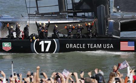 Members of the Oracle Team USA celebrate winning the overall title of the 34th America's Cup yacht sailing race over Emirates Team New Zealand in San Francisco, California September 25, 2013.
REUTERS/Stephen Lam Members of the Oracle Team USA celebrate winning the overall title of the 34th America's Cup yacht sailing race over Emirates Team New Zealand in San Francisco, California September 25, 2013.
REUTERS/Stephen Lam