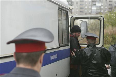 A Greenpeace International activist from Canada, arrested for staging a protest at Russia's first Arctic offshore oil platform, arrives at the Leninsky District Court in Murmansk, September 26, 2013, in this handout provided by Greenpeace.
REUTERS/Igor Podgorny/Greenpeace/Handout via Reuters A Greenpeace International activist from Canada, arrested for staging a protest at Russia's first Arctic offshore oil platform, arrives at the Leninsky District Court in Murmansk, September 26, 2013, in this handout provided by Greenpeace.
REUTERS/Igor Podgorny/Greenpeace/Handout via Reuters