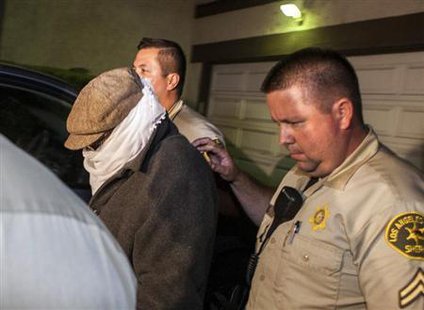 Nakoula Basseley Nakoula (L) is escorted out of his home by Los Angeles County Sheriff's officers in Cerritos, California September 15, 2012.
Credit: Reuters/Bret Hartman Nakoula Basseley Nakoula (L) is escorted out of his home by Los Angeles County Sheriff's officers in Cerritos, California September 15, 2012.
Credit: Reuters/Bret Hartman