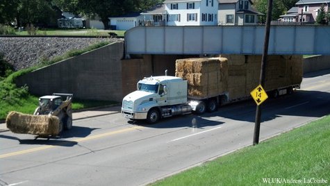A semi truck hauling hay got stuck under a railroad overpass in De Pere on Thursday, September 26, 2013. (Photo by: FOX 11). A semi truck hauling hay got stuck under a railroad overpass in De Pere on Thursday, September 26, 2013. (Photo by: FOX 11).