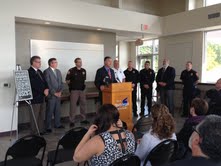 Wisconsin Attorney General J.B. Van Hollen, surrounded by local law enforcement and state legislators, speaks at King Park Pavilion as part of the statewide unveiling of a public awareness campaign against heroin. Wisconsin Attorney General J.B. Van Hollen, surrounded by local law enforcement and state legislators, speaks at King Park Pavilion as part of the statewide unveiling of a public awareness campaign against heroin.