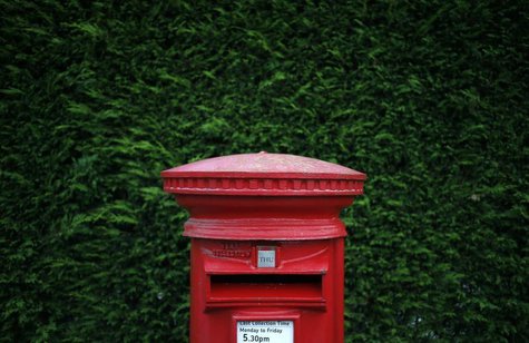 A Royal Mail post box stands on a street corner in Manchester, northern England September 12, 2013. REUTERS/Phil Noble A Royal Mail post box stands on a street corner in Manchester, northern England September 12, 2013. REUTERS/Phil Noble