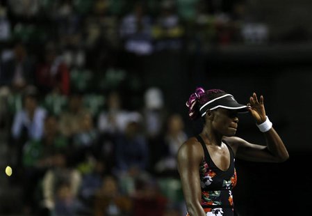 Venus Williams of the U.S. reacts as she loses a point against Petra Kvitova of the Czech Republic during their semi-final of the Pan Pacifi Venus Williams of the U.S. reacts as she loses a point against Petra Kvitova of the Czech Republic during their semi-final of the Pan Pacifi