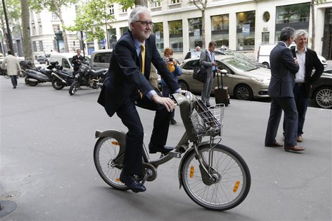 British Cycling President Brian Cookson rides a Velib self-service public bicycle during a photo session after a news conference in Paris Ju British Cycling President Brian Cookson rides a Velib self-service public bicycle during a photo session after a news conference in Paris Ju