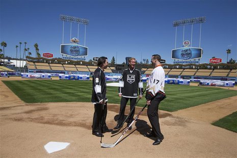 Los Angeles Kings' Drew Doughty (L-R), Jeff Carter, and Anaheim Ducks Dustin Penner chat after a news conference at Dodgers Stadium in Los A Los Angeles Kings' Drew Doughty (L-R), Jeff Carter, and Anaheim Ducks Dustin Penner chat after a news conference at Dodgers Stadium in Los A