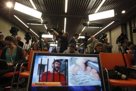 Journalists attend a news conference of Russian arms dealer Viktor Bout, his wife Alla and lawyer Albert Dayan via a video link from the U.S Journalists attend a news conference of Russian arms dealer Viktor Bout, his wife Alla and lawyer Albert Dayan via a video link from the U.S