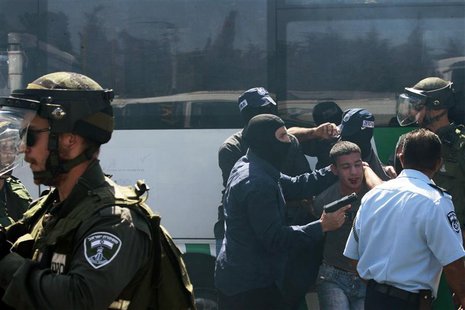 Undercover Israeli policemen (R) detain a Palestinian during clashes following Friday prayers near Damascus Gate in Jerusalem's Old City Sep Undercover Israeli policemen (R) detain a Palestinian during clashes following Friday prayers near Damascus Gate in Jerusalem's Old City Sep