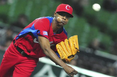 Cuba's Raciel Iglesias pitches a ball during the last preparation game for the World Baseball Classic (WBC) in Fukuoka in this March 1, 2013 Cuba's Raciel Iglesias pitches a ball during the last preparation game for the World Baseball Classic (WBC) in Fukuoka in this March 1, 2013