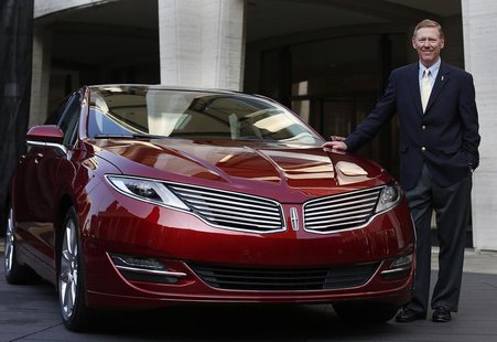 Alan Mulally, president and CEO of Ford Motor Company, stands next to the Lincoln MKZ mid-size sedan during a news conference in New York De Alan Mulally, president and CEO of Ford Motor Company, stands next to the Lincoln MKZ mid-size sedan during a news conference in New York De