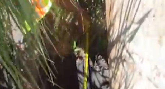 Measuring the drop at the base of the pier in question. Video capture from WisDOT video supplied to Midwest Communications