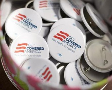 Get Covered America buttons are seen during a training session in Chicago, Illinois September 7, 2013 before volunteers canvas a Chicago neighborhood to talk with residents about the Affordable Care Act - also known as Obamacare.
REUTERS/John Gress Get Covered America buttons are seen during a training session in Chicago, Illinois September 7, 2013 before volunteers canvas a Chicago neighborhood to talk with residents about the Affordable Care Act - also known as Obamacare.
REUTERS/John Gress