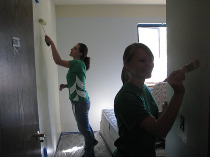 Volunteers painting Family Crisis Center Volunteers painting Family Crisis Center