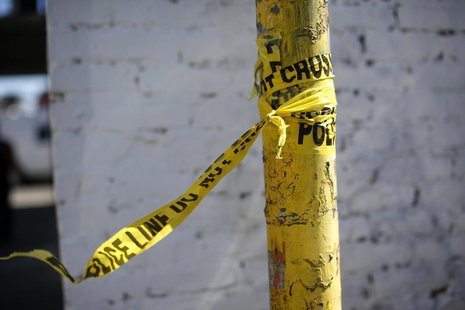 A police line tape is seen at the site of the fatal stabbing of a Los Angeles Dodgers fan after he attended a baseball game in San Francisco A police line tape is seen at the site of the fatal stabbing of a Los Angeles Dodgers fan after he attended a baseball game in San Francisco