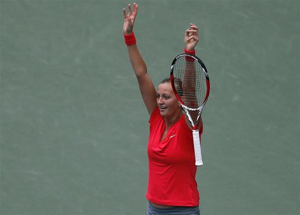 Petra Kvitova of the Czech Republic celebrates after defeating Angelique Kerber of Germany during their singles final match at the Pan Pacif Petra Kvitova of the Czech Republic celebrates after defeating Angelique Kerber of Germany during their singles final match at the Pan Pacif