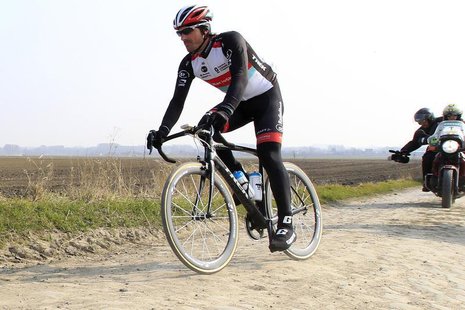 Radioshack rider Fabian Cancellara of Switzerland cycles on a cobble-stoned section of the Paris-Roubaix cycling race during training in Hav Radioshack rider Fabian Cancellara of Switzerland cycles on a cobble-stoned section of the Paris-Roubaix cycling race during training in Hav