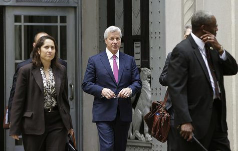J.P. Morgan CEO Jamie Dimon (C) leaves the U.S. Justice Department after meeting with Attorney General Eric Holder, in Washington September J.P. Morgan CEO Jamie Dimon (C) leaves the U.S. Justice Department after meeting with Attorney General Eric Holder, in Washington September