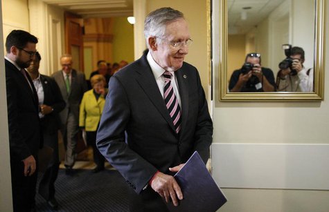U.S. Senate Majority Leader Harry Reid arrives for a news conference with fellow Democrats after the Senate passed a spending bill to avoid U.S. Senate Majority Leader Harry Reid arrives for a news conference with fellow Democrats after the Senate passed a spending bill to avoid