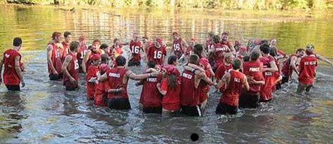 Members of the Class of 2016 celebrate in the Macatawa River after taking the 2013 Hope College Pull tug-of-war on Sept. 28, 2013. (photo courtesy Hope College) Members of the Class of 2016 celebrate in the Macatawa River after taking the 2013 Hope College Pull tug-of-war on Sept. 28, 2013. (photo courtesy Hope College)