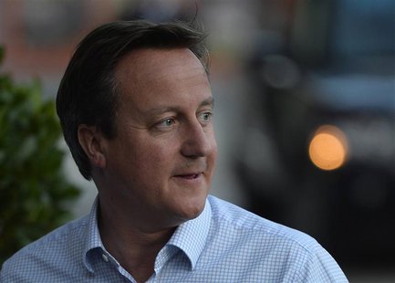 Britain's Prime Minister David Cameron arrives at his hotel in Manchester, northern England, September 28, 2013. REUTERS/Toby Melville Britain's Prime Minister David Cameron arrives at his hotel in Manchester, northern England, September 28, 2013. REUTERS/Toby Melville