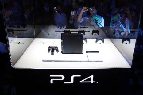 Visitors take pictures of Sony Corp's PlayStation 4 new game console at the Tokyo Game Show in Chiba, east of Tokyo, September 19, 2013. REU Visitors take pictures of Sony Corp's PlayStation 4 new game console at the Tokyo Game Show in Chiba, east of Tokyo, September 19, 2013. REU