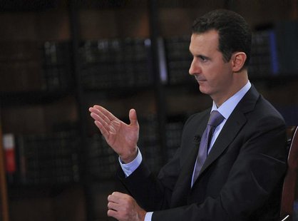 Syria's President Bashar al-Assad speaks during an interview with Italian television station RaiNews24 in Damascus in this handout photograp Syria's President Bashar al-Assad speaks during an interview with Italian television station RaiNews24 in Damascus in this handout photograp