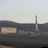 A SpaceX upgraded Falcon 9 rocket undergoes launch preparations at Vandenberg Air Force Base in California September 27, 2013. REUTERS/Gene A SpaceX upgraded Falcon 9 rocket undergoes launch preparations at Vandenberg Air Force Base in California September 27, 2013. REUTERS/Gene