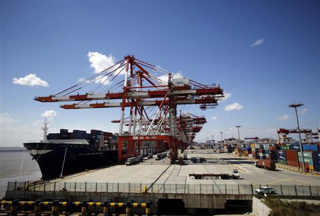 A container ship is seen at the Yangshan Deep Water Port, part of the newly announced Shanghai Free Trade Zone, south of Shanghai September A container ship is seen at the Yangshan Deep Water Port, part of the newly announced Shanghai Free Trade Zone, south of Shanghai September