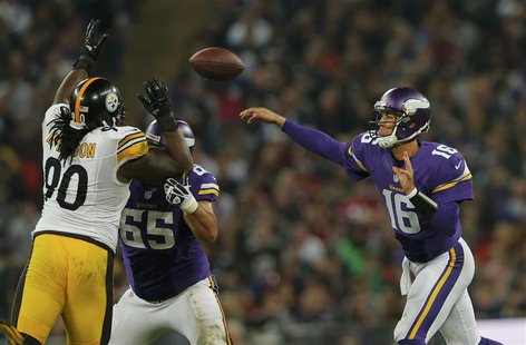 Minnesota Vikings quarterback Matt Cassel throws in the fourth quarter as Pittsburgh Steelers nose tackle Steve McLendon (L) defends during Minnesota Vikings quarterback Matt Cassel throws in the fourth quarter as Pittsburgh Steelers nose tackle Steve McLendon (L) defends during