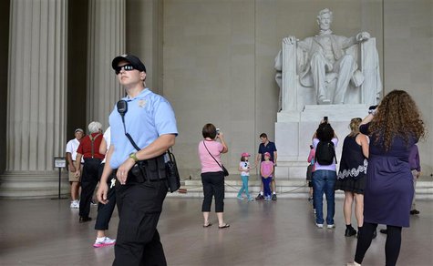 A US Parks Policeman walks among tourists flocking to the Lincoln Memorial, in Washington, September 29, 2013, as a possible government shut A US Parks Policeman walks among tourists flocking to the Lincoln Memorial, in Washington, September 29, 2013, as a possible government shut