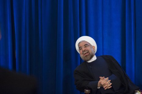 Iran's President Hassan Rohani laughs as he speaks during an event hosted by the Council on Foreign Relations and the Asia Society in New Yo Iran's President Hassan Rohani laughs as he speaks during an event hosted by the Council on Foreign Relations and the Asia Society in New Yo