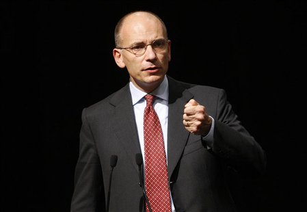 Italy's Prime Minister Enrico Letta gestures during a meeting in Rome, September 29, 2013. REUTERS/Remo Casilli Italy's Prime Minister Enrico Letta gestures during a meeting in Rome, September 29, 2013. REUTERS/Remo Casilli