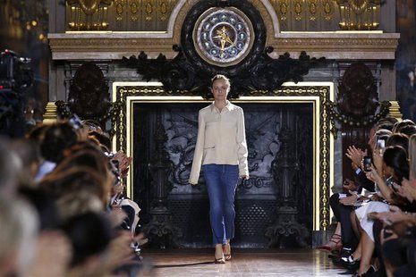 British designer Stella McCartney appears at the end of her Spring/Summer 2014 women's ready-to-wear fashion show during Paris fashion week British designer Stella McCartney appears at the end of her Spring/Summer 2014 women's ready-to-wear fashion show during Paris fashion week