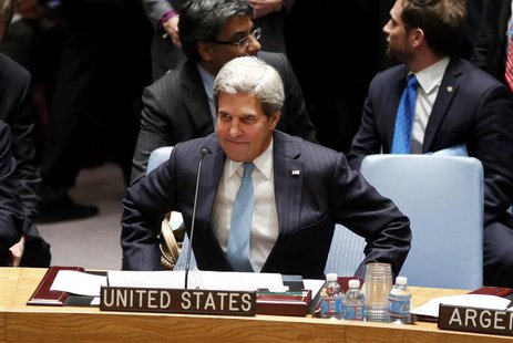 U.S. Secretary of State John Kerry takes his seat moments before the United Nations Security council voted unanimously in favor of a resolut U.S. Secretary of State John Kerry takes his seat moments before the United Nations Security council voted unanimously in favor of a resolut