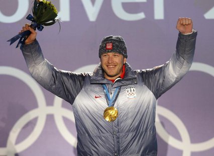 Gold medallist Bode Miller of the U.S. celebrates during the medals ceremony for the men's super combined alpine skiing event during the Van Gold medallist Bode Miller of the U.S. celebrates during the medals ceremony for the men's super combined alpine skiing event during the Van