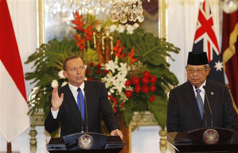 Australia's Prime Minister Tony Abbott speaks beside Indonesia's President Susilo Bambang Yudhoyono during a joint news conference at the Pr Australia's Prime Minister Tony Abbott speaks beside Indonesia's President Susilo Bambang Yudhoyono during a joint news conference at the Pr