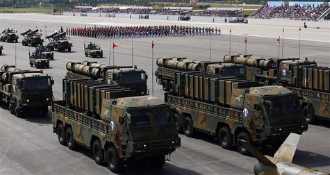 South Korea's new cruise missiles Hyunmoo-3 and Hyunmoo-2 are displayed during events to mark the 65th anniversary of Armed Forces Day, at a South Korea's new cruise missiles Hyunmoo-3 and Hyunmoo-2 are displayed during events to mark the 65th anniversary of Armed Forces Day, at a