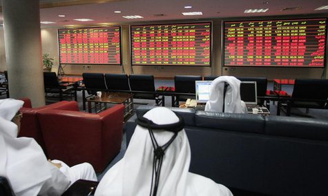 Investors monitor market activity at the Qatar Exchange in Doha September 11, 2011. REUTERS/Mohammed Dabbous Investors monitor market activity at the Qatar Exchange in Doha September 11, 2011. REUTERS/Mohammed Dabbous