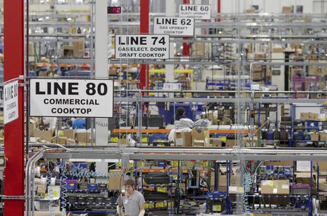 Workers assemble built-in appliances at the Whirlpool manufacturing plant in Cleveland, Tennessee August 21, 2013. REUTERS/Chris Berry Workers assemble built-in appliances at the Whirlpool manufacturing plant in Cleveland, Tennessee August 21, 2013. REUTERS/Chris Berry
