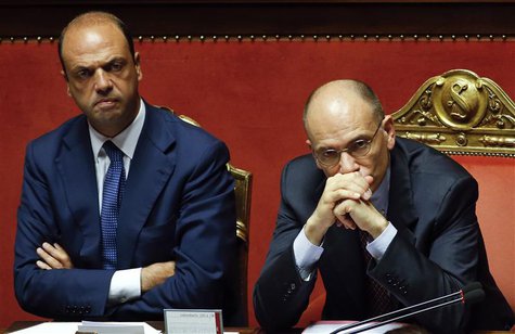 Italy's Prime Minister Enrico Letta (R) looks on next to Interior Minister Angelino Alfano during a vote session at the Senate in Rome in th Italy's Prime Minister Enrico Letta (R) looks on next to Interior Minister Angelino Alfano during a vote session at the Senate in Rome in th