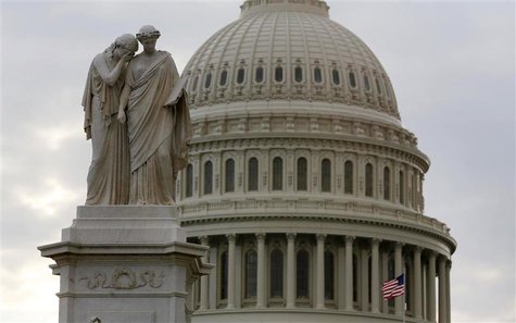 The U.S. Capitol dome is seen behind a statue on Capitol Hill in Washington after the U.S. government shutdown, October 1, 2013. REUTERS/Lar The U.S. Capitol dome is seen behind a statue on Capitol Hill in Washington after the U.S. government shutdown, October 1, 2013. REUTERS/Lar