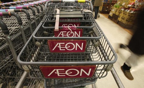 The logo of Aeon Co is seen on shopping carts at its supermarket in Tokyo January 10, 2013. REUTERS/Toru Hanai The logo of Aeon Co is seen on shopping carts at its supermarket in Tokyo January 10, 2013. REUTERS/Toru Hanai